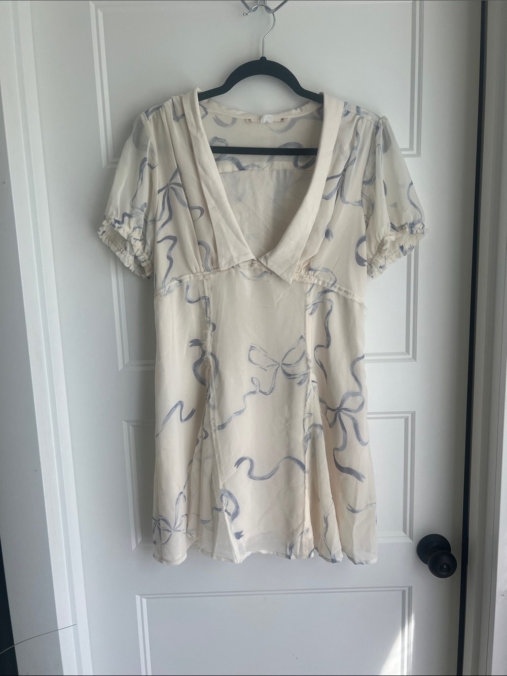 Kimchi Blue Cream mini dress with Subtle Blue Accent